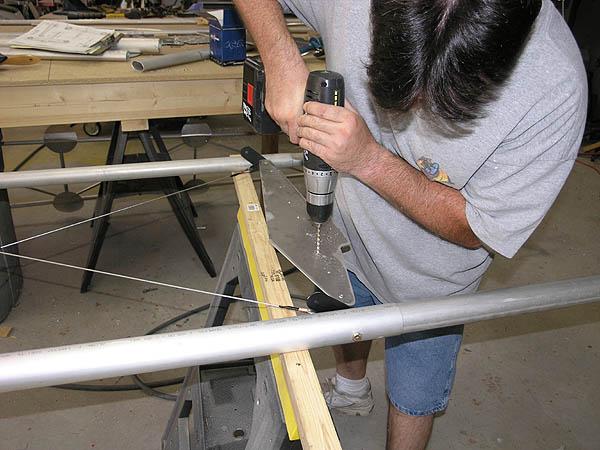 istrutplates.jpg - Todd working on the top wing.
